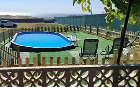 Casa en primera línea de playa, Doniños